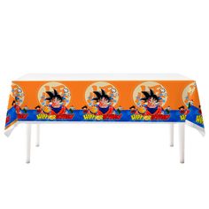 an orange table cloth with the image of person on it and three images of dragon ball characters