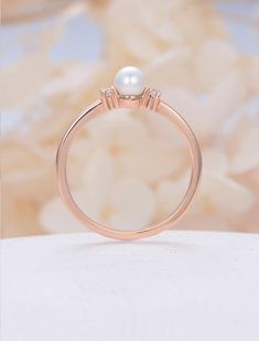 Pearl engagement ring rose gold Diamond wedding women Dainty | Etsy 14k Rose Gold Wedding Ring With Diamond Accents, Timeless 14k Rose Gold Diamond Wedding Ring, Timeless 14k Rose Gold Wedding Jewelry, Timeless 14k Rose Gold Wedding Rings, Classic Pearl Promise Ring, Rose Gold Single Diamond Promise Ring, Classic Rose Gold Wedding Ring, Minimalist Wedding Diamond Ring With Halo Setting, Timeless Rose Gold Diamond Ring Gift