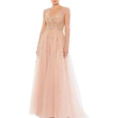 New With Tag Mac Duggal Embellished Sequined Long Sleeves Evening Gown Color: Light Peachy Pink / Champagne Available In Size: 8 Note: Available In More Colors And Sizes In Separate Listings In Our Shop. Long Sleeves Mesh Sleeves Embellished Embellished Mesh Beaded Sequins Sparkle Hidden Back Zipper P11-3 2-4 1 Bin-17 Embellished Tulle Gown With V-neck, Embellished Tulle Mother Of The Bride Dress For Gala, Elegant Peach Tulle Dresses, Glamorous Pink Tulle Gown, Pink Long Sleeve Evening Dress For Gala, Glamorous Pink Mother Of The Bride Dress, Embellished Feminine Wedding Dress, Elegant Peach Evening Dress For Wedding, Feminine Embellished Wedding Dress