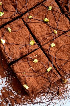 there is a chocolate cake with some flowers on it