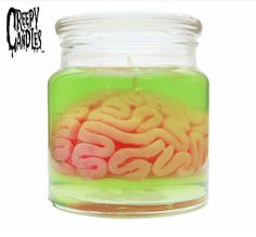 a jar filled with lots of different types of brain candy in it's lid