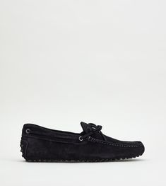 Tod's Gommino driving shoes in velvet suede with exposed hand stitching, hot-stamped monogram, front tie and iconic rubber pebble outsole. A timeless design available in a wide range of colors. Man Black, Monogrammed Leather, Driving Shoes, Leather Shoes Men, Sperrys, Moccasins, All Black Sneakers, Hand Stitching, Boat Shoes