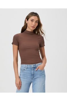 This slim short sleeve top is made from our supremely soft ribbed modal fabrication and features a mock neck silhouette. Well be wearing this easy, casual brown top with everything from denim to joggers. Trendy Fitted Mock Neck Top For Layering, Fitted Trendy Mock Neck Top For Layering, Trendy Fitted Mock Neck Top For Spring, Casual Fitted Mock Neck Top For Layering, Summer Casual Fitted Mock Neck Top, Fitted Turtleneck T-shirt For Spring, Versatile Fitted Mock Neck Top For Spring, Trendy Fitted Mock Neck Top For Summer, Fitted Brown T-shirt For Spring