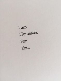 the words i am homesick for you are written in black ink on white paper