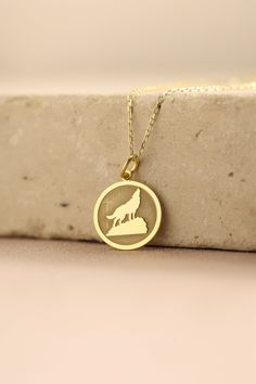 Gold Wolf Pendant - howling wolf Gold Necklace ● Material of pendant: Solid Gold 14k ( REAL GOLD ) ● Metal Stamp: 14k ( REAL GOLD ) ● The pendant is available in 5 sizes: - 12,7 mm / 0.5 inches (Diameter) - 14,0 mm / 0,55 inches ( Diameter ) In the photos - 15,3 mm / 0.6 inches ( Diameter ) - 16,5 mm / 0,65 inches ( Diameter ) - 19,1 mm / 0,75 inches ( Diameter ) ( In the photos the size is 14mm / 0.55 inches Diameter ) ( Jump Ring inner diameter: 4 mm ) ● Material of chain: Solid gold 14k ( REA Round Wolf Design Jewelry Gift, Wolf Design Round Jewelry Gift, Wolf Pendant, Wolves Pendants, Wolf Necklace, Howling Wolf, Wolf Howling, Necklace Personalized, Coin Necklace