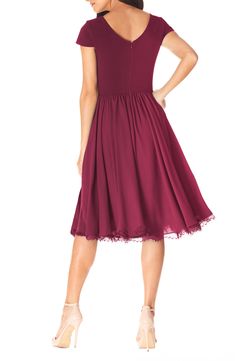 You'll be ready to twirl out onto the dance floor at the first downbeat in this crepe dress featuring a chiffon skirt with loads of flair/flare. 42" length (size Medium) Hidden back-zip closure V-neck Cap sleeves Lined 97% polyester, 3% spandex bodice with 100% polyester skirt Machine wash, line dry Imported Special Occasion Lace Hem Dress, Flare Cocktail Dress, Fit And Flare Cocktail Dress, Dark Magenta, Midi Length Skirts, Dress The Population, Lace Hem, Chiffon Skirt, Capped Sleeve Dress