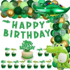 a birthday party with balloons, cupcakes and an alligator balloon arch that says happy birthday