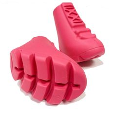 pair of pink shoe insulators on white background