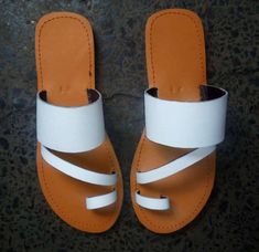 This sandals are 100% hand crafted using white and brown leather They are supper nice for evening wear,summer,outdoor. All sizes are available as we custom make them. For perfect fitting kindly use the last image as a guide. Ships via DHL express. Flat Sandals Wedding, Custom Sandal, Ankle Strap Sandals Flat, White Leather Sandals, Black Gladiator Sandals, Brown Wedge Sandals, Dressy Sandals, Womens Gladiator Sandals, Closed Toe Sandals