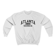 Atlanta Georgia unisex sweatshirt. The perfect sweatshirt for your favorite city. - Unisex Size - Printed on the Gilden 1800 Sweatshirt - Loose fit - 50% Cotton; 50% Polyester (fibre content may vary for different colors) - Processing usually takes 4-7 and shipping usually takes 3-5 days - Medium fabric (8.0 oz/yd² (271.25 g/m - Sewn in label - Runs true to size Santa Rosa California, New York Sweatshirt, Burlington Vermont, Beach Sweatshirt, Collegiate Style, Chattanooga Tennessee, Long Beach California, Jersey Sweatshirt, Hilton Head Island