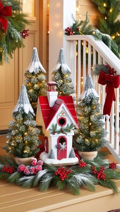 christmas decorations on the front steps of a house