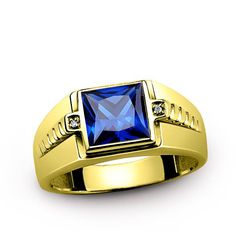 Metal: 10k Yellow Gold Sapphire: carat total weight - 3.20 0.7cm x 0.7cm setting - Bezel setting Diamonds: carat total weight - 0.01 color - H clarity - VS1 setting - Pave setting Power and beauty come to mind in the presence of this stunning 10k gold ring. One blue sapphire anchors the piece at the center, accented with 2 diamonds. Always elegant, classic and sophisticated! ----------------------------------------------------------------------Sapphire The magnificent and holy Sapphire, in all i Sapphire Gold Ring, Mens Ring Designs, Yellow Gold Mens Rings, Blue Sapphire Diamond Ring, Mens Gemstone Rings, Blue Gemstone Rings, 10k Gold Ring, Gold Ring Designs, Blue Sapphire Diamond