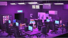 a computer lab with multiple monitors and laptops