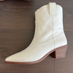 Pointed Toe Cowboy Boots In Size 7.5. 2 Inch Heel. Never Been Worn Cream Wide Calf Pointed Toe Boots, Cream Western Boots For Fall, Cream Pointed Toe Boots For Fall, Cream Pointed Toe Mid-calf Boots For Fall, Cream Ankle-high Western Boots, Chic Beige Heeled Boots With Snip Toe, Chic Beige Snip Toe Heeled Boots, Cream Snip Toe Boots For Fall, Western Cream Ankle Boots