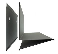 an open laptop computer case sitting on top of a white table next to it's side