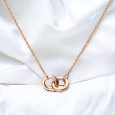 This simple yet interesting design is versatile for all occasions Delicate, classic, and stylish, this necklace is great for every day and every evening  A pair of gold circles are linked together and attached to a chain with jump rings; the chain is secured by a clasp. Metal: Solid 14k Gold (Can be made in Yellow gold/Rose gold/White gold) Introducing our exquisite collection of 14k gold connection pendant necklaces, where timeless elegance meets modern design. Crafted with utmost care and atte Chain Necklace For Men, Two Rings, Women Pendant, Interesting Design, Gold Link, Link Chain Necklace, Necklace For Men, Necklace Dainty, White Rose Gold