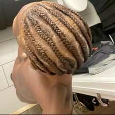 brown cornrows | black boy hair | blonde | hair inspo | black men | fashion | highlights | bleached | eyebrows | model | that boy | makeover | trendy | photography | cute | hairstyle | braids | afro | wavy part Brown Cornrows, Studs Hairstyles, Blonde Cornrows, Light Brown Hair Men, Afro Hair Fade, Hair Inspo Black, Cornrows Men, Bleached Brows