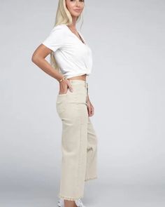 Elevate your denim game with our Acid Washed High Waist Frayed Hem Straight Pants. The high waist design not only adds a trendy touch but also ensures a flattering fit. Crafted from denim with a good stretch, they provide exceptional comfort for all-day wear. The zip fly and back pockets offer both functionality and fashion, making these pants a practical choice for any occasion. With their frayed hem and straight wide leg, these pants are a must-have addition to your wardrobe, delivering a mode Sand Beige, Shoes With Jeans, Good Stretches, Straight Pants, The High, Jeans Dress, Loafer Flats, Shoe Boots, High Waist