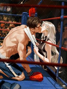 a man and woman kissing in a boxing ring