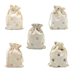 four bags with flowers on them are shown in different colors and sizes, one has a draws