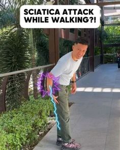 a young man standing on top of a sidewalk next to a purple and white dragon