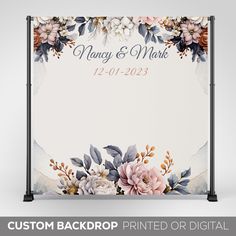 a wedding sign with flowers and leaves on it, in front of a white background