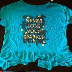 - Justice - Girls - Size 8 - Nwt - Turquoise, Black And Silver - Brand New! (Only Wrinkled Because I Found It Shoved In The Back Of My Daughter’s Drawer. Lol) Blue Cotton T-shirt With Ruffles, Justice 2000s, Summer List, Glitter Tee, Tied T Shirt, Cheer Shirts, Justice Shirts, Hearts Girl, Camo Shirts