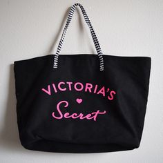 Victoria Secret Beach Tote Bag Never Used Black With Hot Pink Writing Black And White Straps Black And White Striped On The Inside Approx. 16”L 13”H 6” W Chic Victoria's Secret Beach Bag, Victoria's Secret Casual Beach Bag, Black Canvas Shopping Bag, Trendy Large Capacity Victoria's Secret Bag, Victoria's Secret Black Bag For Everyday Use, Trendy Victoria's Secret Bags For Daily Use, Trendy Victoria's Secret Black Shoulder Bag, Trendy Victoria's Secret Black Bag, Trendy Black Victoria's Secret Shoulder Bag