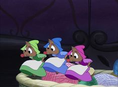 three cartoon characters are sitting in a basket