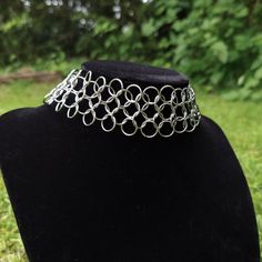 Hand woven European 4 in 1 chainmail choker necklace. Adjustable in length from 32.5cm/12.7in - 36cm/14in. Made in stainless steel jumprings that are 10mm/1mm(18g). Closes with a lobster claw clasp. Metal Chainmail Choker As A Gift, Metal Chainmail Choker Necklace, Silver Chainmail Choker As A Gift, Adjustable Nickel-free Choker Chain Necklace, Adjustable Stainless Steel Chain Choker Necklace, Adjustable Stainless Steel Choker Chain Necklace, Adjustable Stainless Steel Chain Choker, Adjustable Chain Link Choker As Gift, Metal Chain Link Choker As Gift