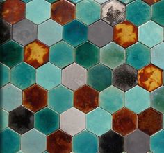 a close up view of some colorful tiles