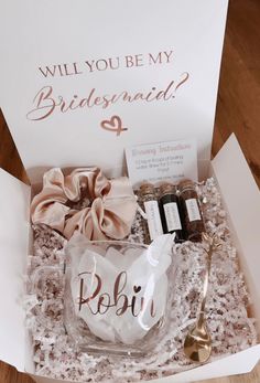 the bridesmaid gift box is open and ready to be delivered in it's new home