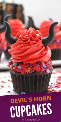 devil's horn cupcakes with red frosting and sprinkles