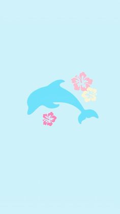 a dolphin and flowers floating in the air