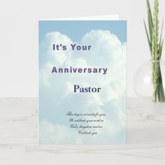 it's your anniversary pastor card on a table next to a vase with flowers