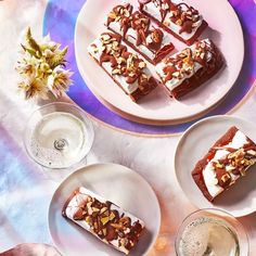 desserts and drinks are on the table ready to be eaten