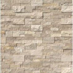 a white brick wall that has been made out of stone blocks and is very high resolution