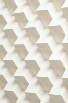 an abstract white wall made up of cubes