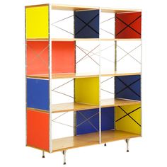 a multicolored shelving unit with four shelves