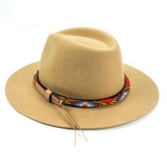 Price includes a Lola Sambboho hat & a Red Vogue hatband. Save 10% with this bundle. Select hat size. Hatband is one size fits all. Hatband is removable.  An iconic must-have Fedora hat that will never get out of fashion. Sambboho's Lola hat has a soft brim and indented crown. A chic piece to be worn at all seasons Red Vogue, Hat Bands, Seasons Of The Year, Sand Color, Hat Band, Fedora Hat, Hat Making, Hat Sizes, One Size Fits All