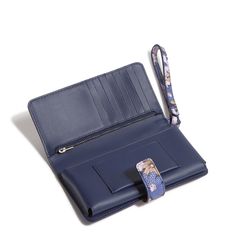 Combining sleek design with practical functionality, this wristlet keeps your phone and essentials within easy reach, ensuring you stay connected in style. Outlet Exclusive Interior features eight card slip pockets, a zip pocket and a phone pocket Snap closure. Dimensions: 6. 75" w x 3. 75" h Handle/Strap Wrist strap drop 6. 0" Vera Bradley Outlet Women's Phone Wristlet in Trellis Floral Work Backpack, Phone Wristlet, Weekend Travel Bags, Medium Backpack, Belt Purse, Toiletry Bag Travel, Small Backpack, Large Backpack, Travel Wallets