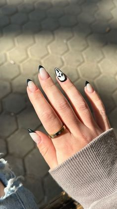 37 Halloween Nail Designs You’ll Want To Recreate This YearHalloween Nails 2024 Black Ghostface Nails, Valentines Scream Nails, Simple Black Almond Nails, Halloween Black French Tip Nails, Halloween Valentines Nails, Scream Nails Easy, Ghostface Acrylic Nails, Halloween Ghostface Nails, Halloween Nails Black French Tip