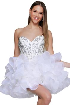 Expertly crafted by Jovani, the 39932 Short Beaded Corset Homecoming Dress exudes sophistication and elegance. With its intricate beadwork and ruffled skirt, this crystal strapless cocktail dress is sure to make a statement at any event. Embrace timeless style in this stunning piece. Corset Homecoming Dress, Beaded Corset, Strapless Cocktail Dress, Ruffled Skirt, Dress 16, Ruffle Skirt, Homecoming Dress, Ruffle Dress, Timeless Style