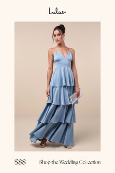 a woman in a blue dress with the words shop the wedding collection on it's page