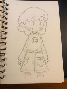 a drawing of a girl with a smile on her face, standing in front of a spiral notebook