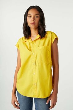 A sleeveless version of amo's everyday oversized collared shirt. featuring a single chest pocket and shell buttons. crafted from soft stonewashed cotton poplin.    color: lemon    fit & measurements:    - fits true to size    - relaxed fit  - cindy is wearing size s and is 5'10"  - fits true to size    fabric & care:    100% cotton poplin    machine wash cold.    made with love in peru Oversized Collared Shirt, What Women Want, Denim Blouse, Shell Buttons, Collared Shirt, Sleeveless Shirt, Denim Top, Denim Shop, Hat Hairstyles