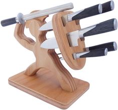 a wooden knife holder with six knives on it's sides and four knives in the middle