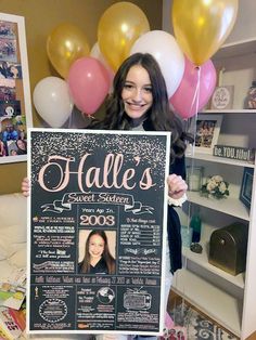 a woman holding up a chalkboard with photos on it and balloons in the background