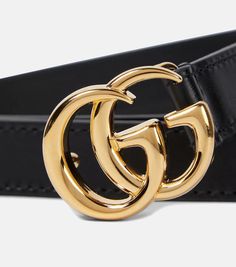 Gucci’s famed GG logo may be decade-old but it’s in accessories like this belt that its timeless allure really shines through – and quite literally so. Made from gleaming gold-toned brass, it’s one of fashion's most coveted and instantly recognizable symbols. Here, it brings unabashed refinement to the overall pared-back black leather profile..Color of fastening: gold.Made in Italy.Material: cow leather.Width 2cm-1'.Buckle width 3cm-1' Elegant Gold-tone Logo Plaque Belt Buckle For Formal Occasions, Timeless Gold Belt Buckles For Formal Wear, Modern Gold-tone Belt Buckles For Formal Occasions, Modern Gold-tone Logo Plaque Belt Buckles For Formal Occasions, Modern Belt Buckles With Gold-tone Logo For Formal Occasions, Modern Gold Belt Buckles, Designer Formal Belt With Gold-tone Logo Plaque, Modern Formal Belt With Gold-tone Logo Plaque, Luxury Gold Belt Buckles With Metal Logo