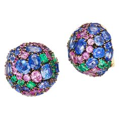 These substantial multi-gem bombé earclips by Marilyn Cooperman for Fred Leighton embody period charm with a wonderfully crafted whorl pattern in 18K gold and silver. Sapphires weighing approximately 28.70 carats. Emeralds weighing approximately 4.50 carats. Stamped FRED LEIGHTON Formal Multicolor Clip-on Earrings, Fred Leighton Jewelry, Fred Leighton, Claire Danes, Deco Originale, Miuccia Prada, Natalie Portman, Van Cleef Arpels, Nicole Kidman